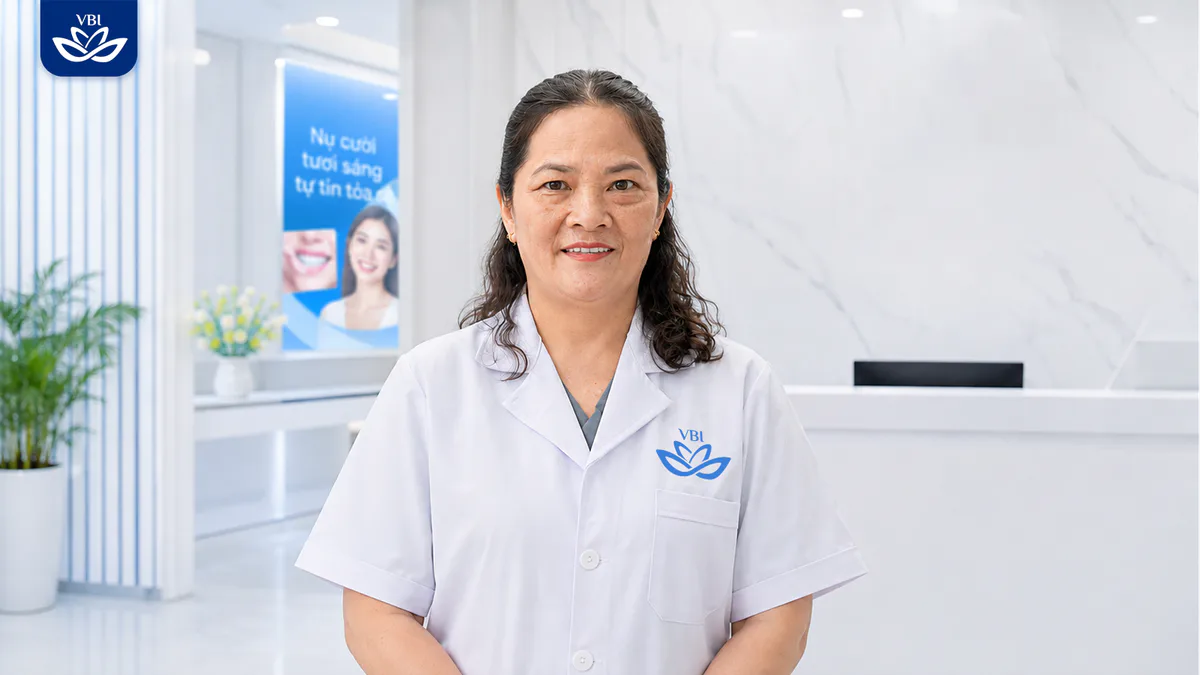 Dr Phuong Nguyen Specialist Level II at Viet Bi Dental Clinic Hanoi in professional medical attire